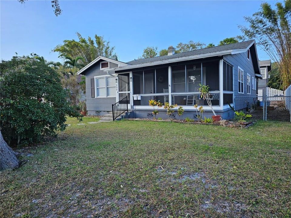 Exterior Front w/ Screened Porch.