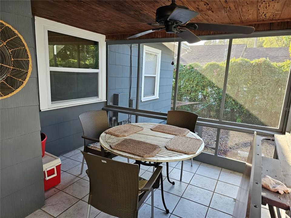 Rear Screened Porch Off of Kitchen w/ Knotty Cypress Ceilings.