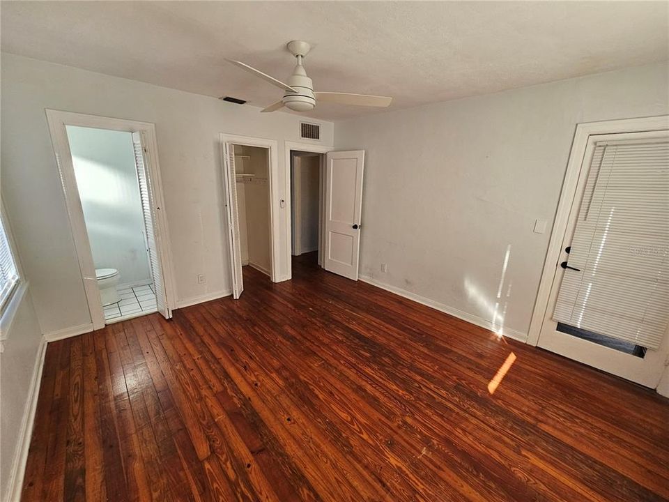 Primary Bedroom w/ Half Bath & Private Entrance From Front Porch.