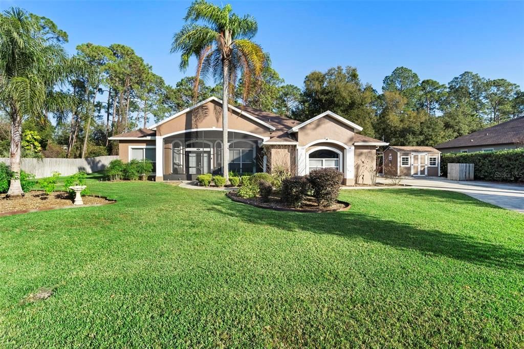 4/2 pool home on nearly 1/2 acre less than a mile from the St. Johns River.