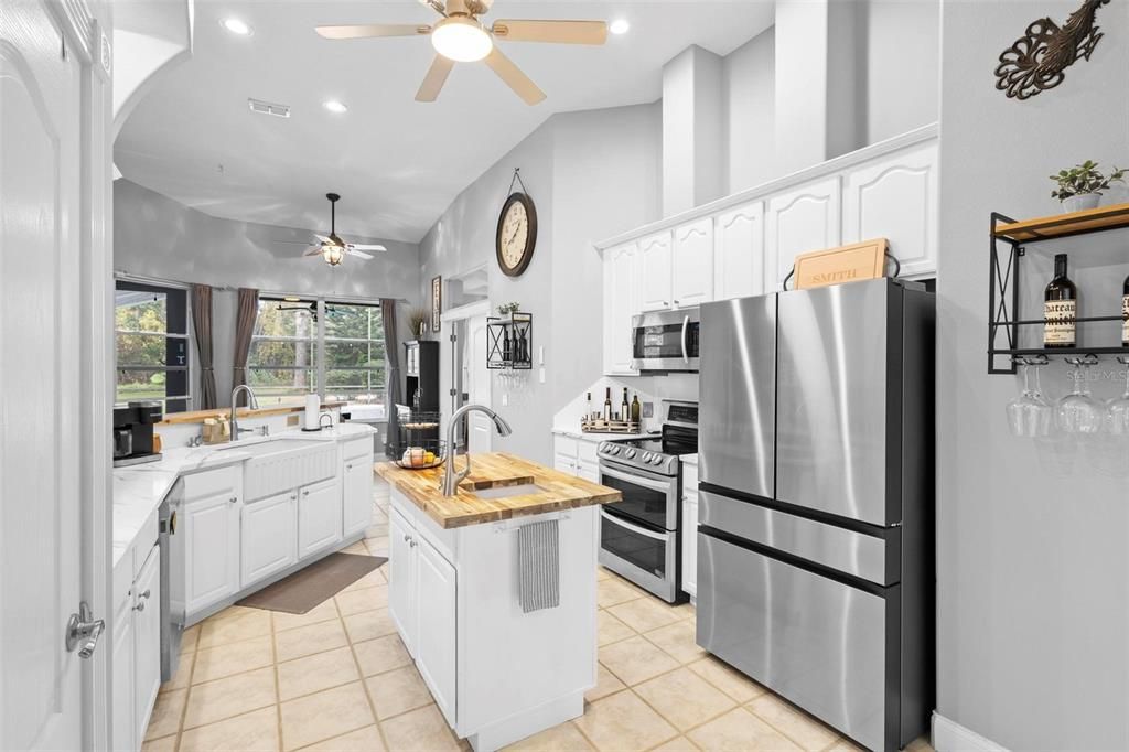 This beautiful kitchen boasts newer stainless-steel appliances.