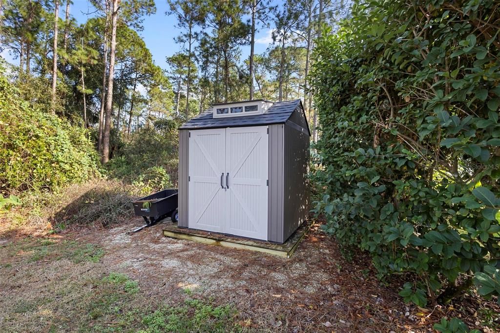 This shed is perfect for storing your toys, and does stay with your new home.