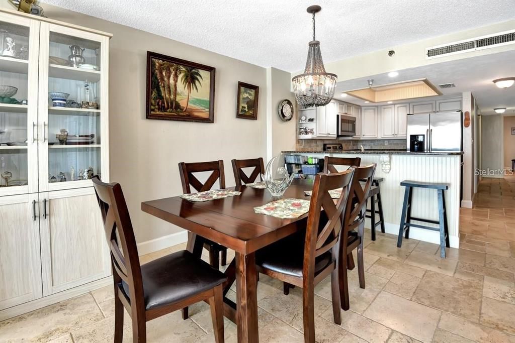 Elegant dining area with stunning ocean views, natural light, and a seamless flow into the living space for effortless entertaining.