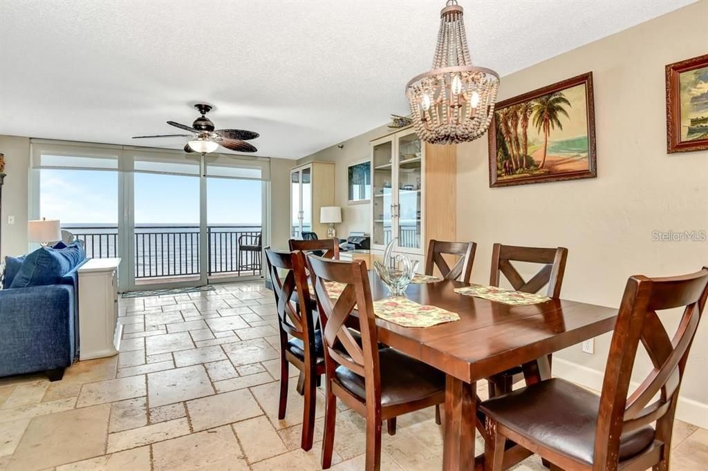 Elegant dining area with stunning ocean views, natural light, and a seamless flow into the living space for effortless entertaining.