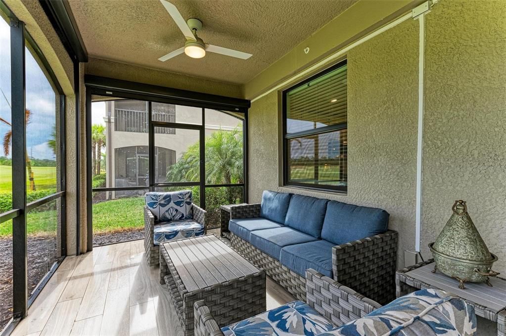 Lanai has access door to the side yard for furry friends and a window opens to the kitchen to enjoy a nice breeze and get excited about what's for dinner!