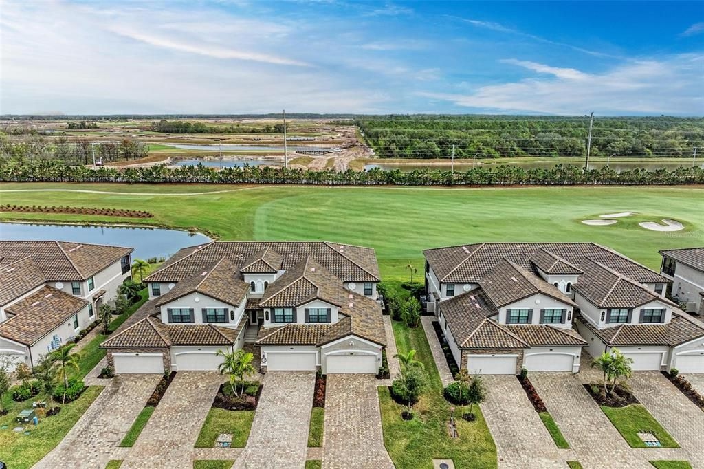 Aerial view of Unit #104, Bottom Right, with Golf Course View Behind to enjoy from your lanai