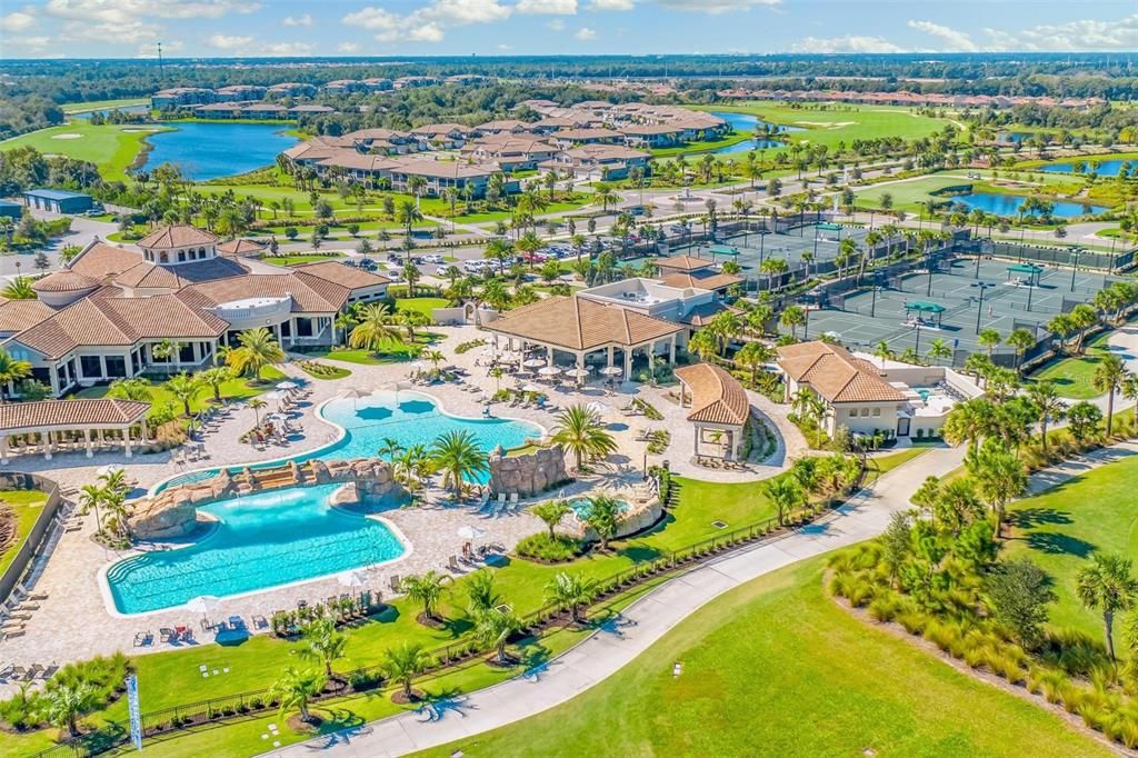 Aerial view of the Resort Style living that features tennis, restaurant and bar, gym, yoga, golf tournaments and so much more!