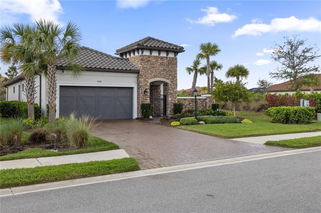 Front photo showcasing home is located on a corner lot.