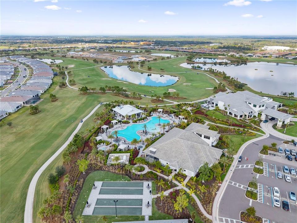 Aerial view of community pool and clubhouse.