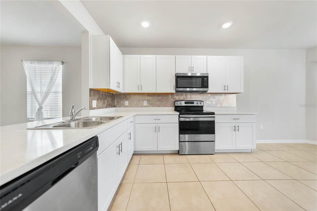 Kitchen with Dinette - Tile Flooring, Quartz Countertops