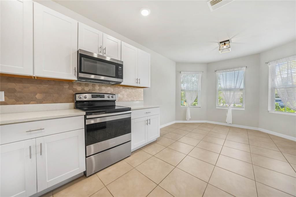 Kitchen with Dinette - Tile Flooring, Quartz Countertops