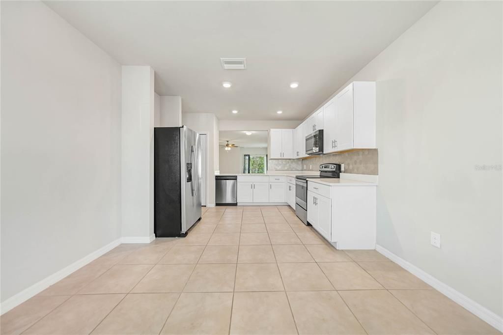 Kitchen with Dinette - Tile Flooring, Quartz Countertops