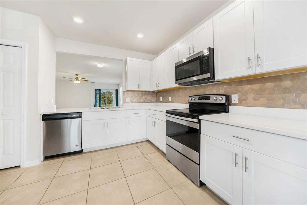 Kitchen with Dinette - Tile Flooring, Quartz Countertops