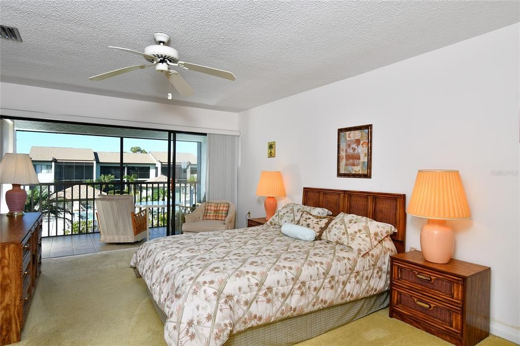 Primary bedroom with lanai view