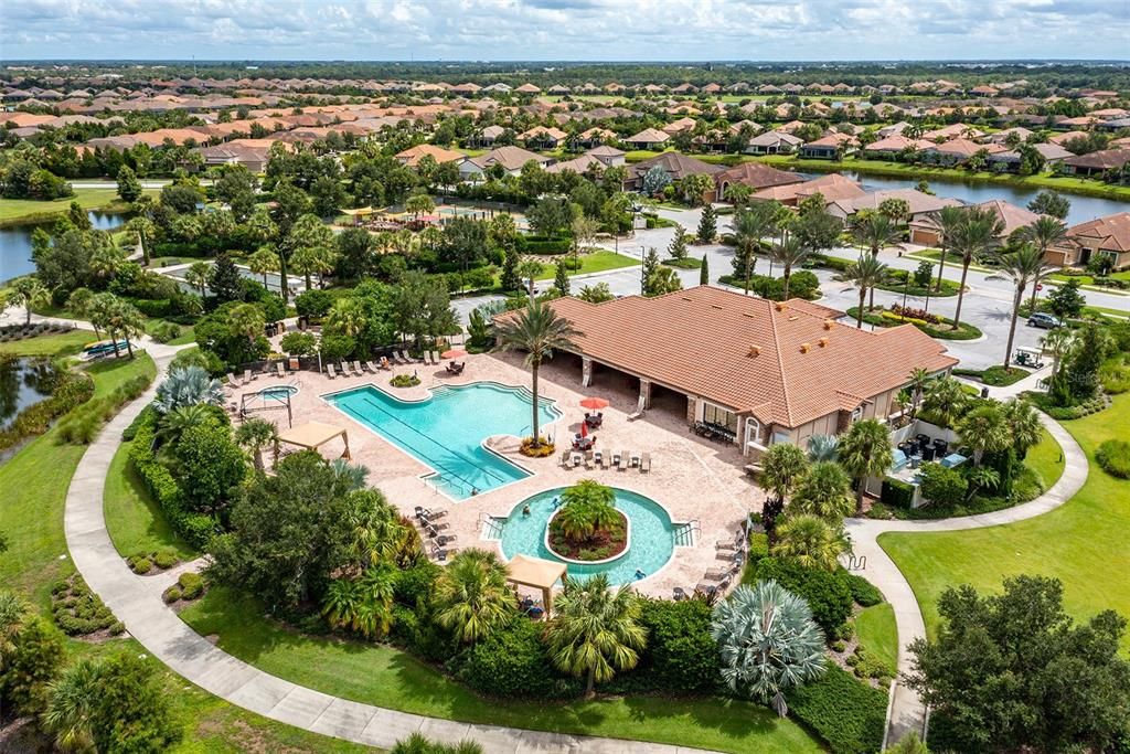 The amenity Center has a whirlpool, lap and swimming pool and a hot tub