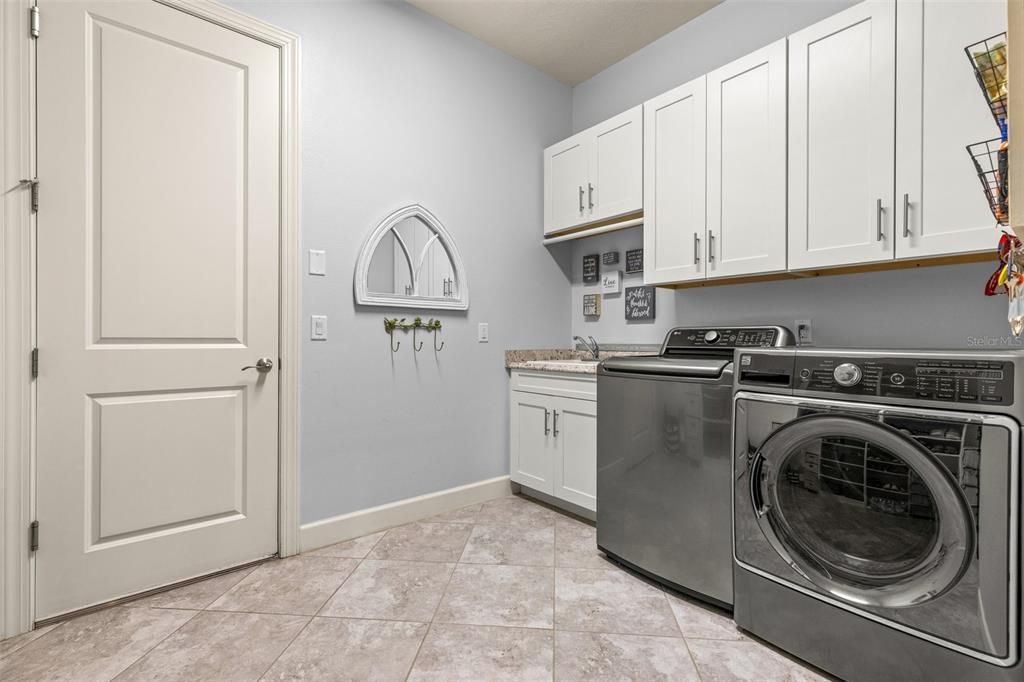 Large laundry room with sink