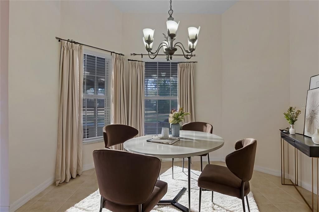 Separate dining area virtually staged