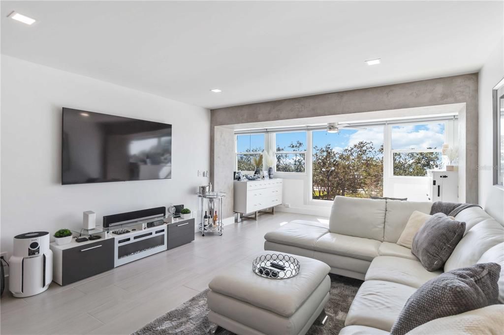 Big Open Living Space Extended into Sun Room