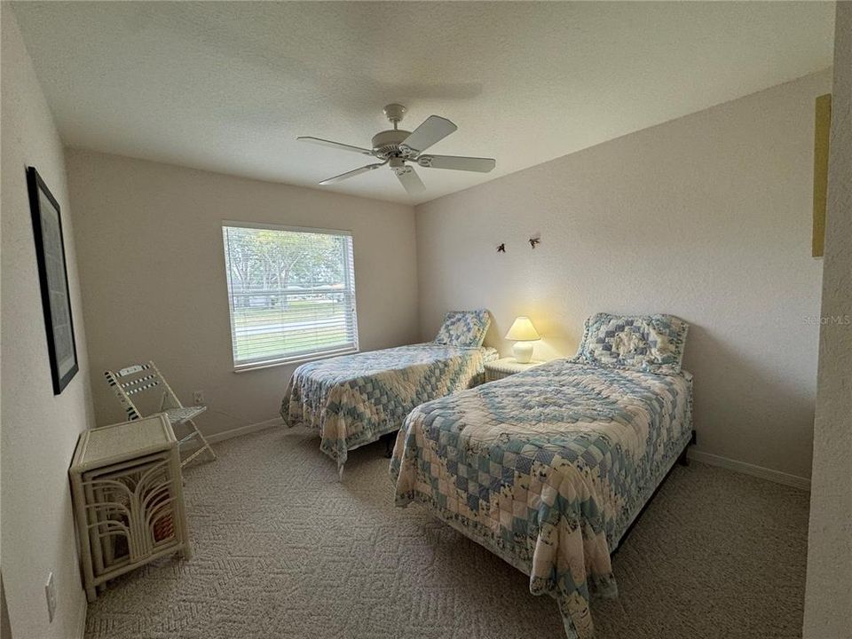 Guest bedroom with lots of natural light.