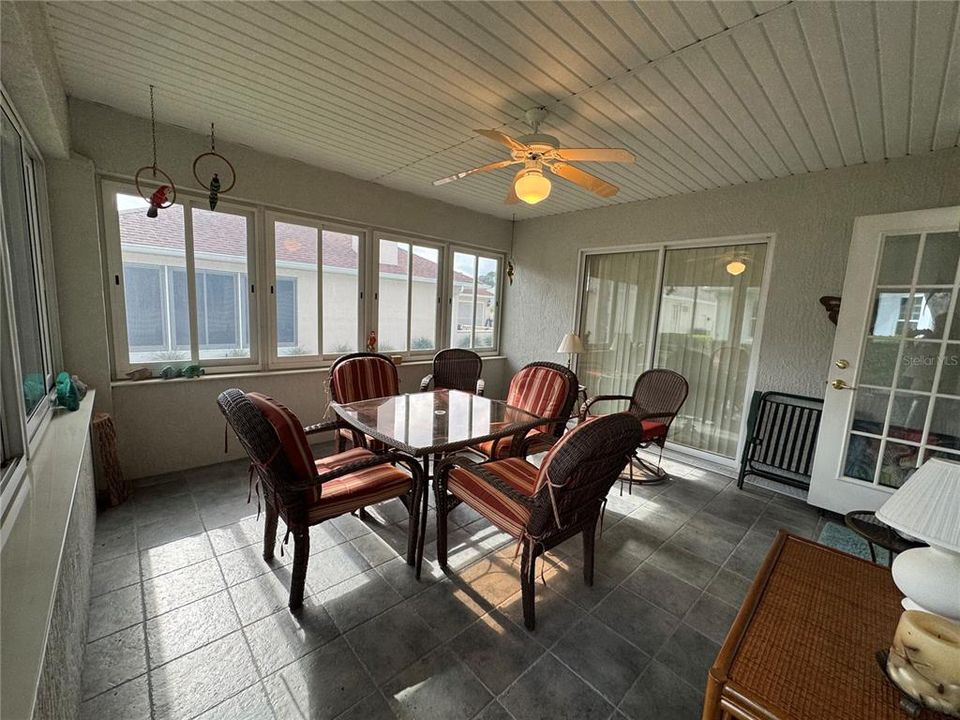 Lanai with lots of windows for natural light.