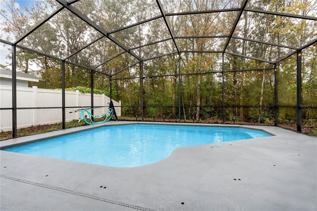 Pool Area is Fully Enclosed - Conservation behind the Home