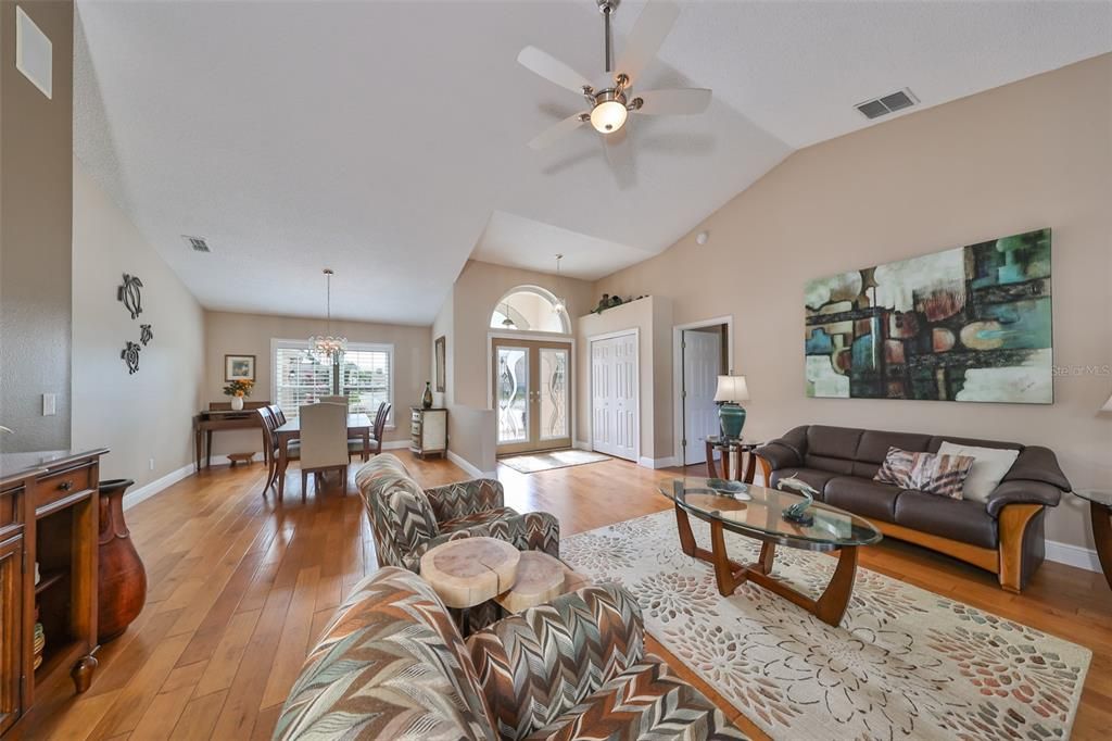 Living Room W/ Beautiful Engineered Honed Wood Flooring Flooring