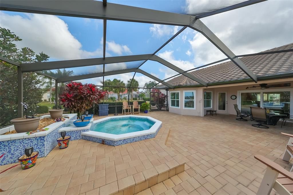 eautiful Spool, Paved Outdoor Living Space & Fountain Feature