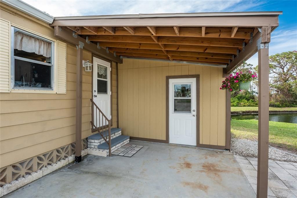 The covering provides shades to your entryway and utility room/storage area.