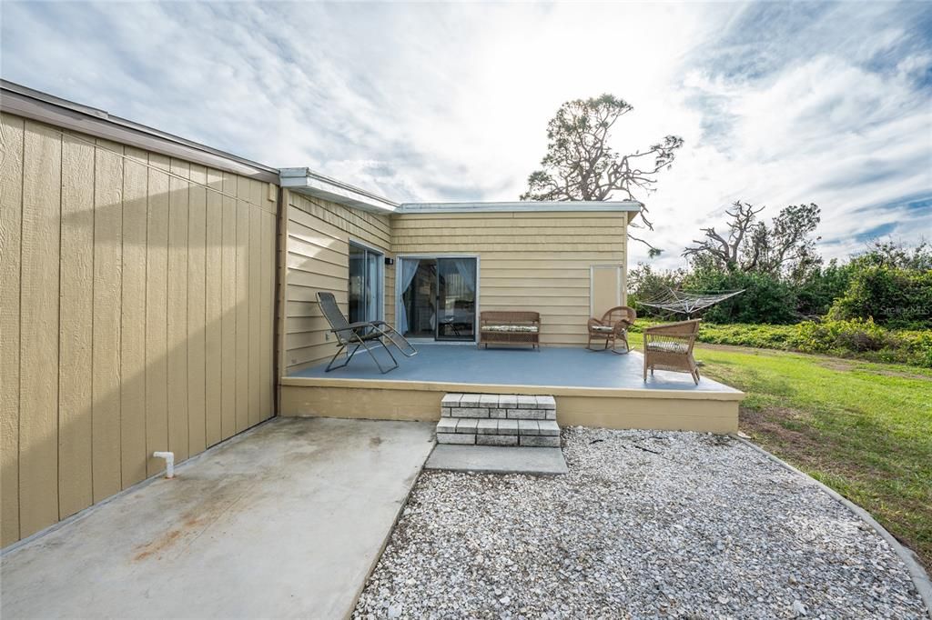 The patio could easily be screened in to create your private lanai.