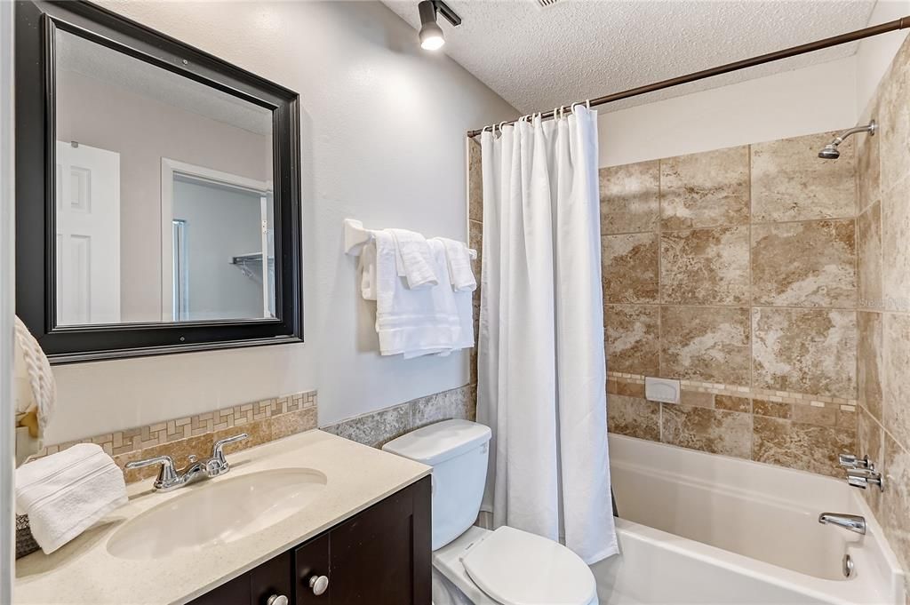 Upstairs full bath with tub/shower combo.