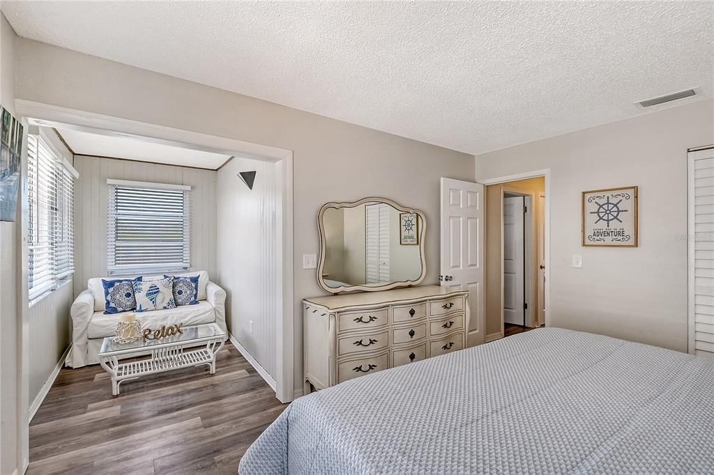 Primary bedroom with walk-in closet and extra flex space