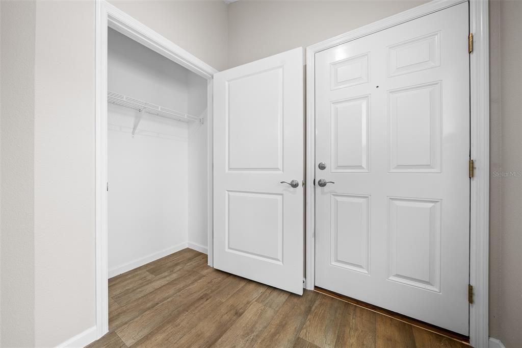 Coat closet adjacent to front door.