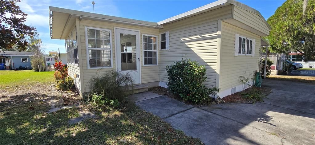 Concrete Walkway to A/C Florida Room