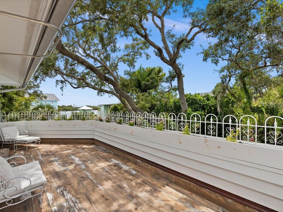 Primary Suite Balcony (tile floor) + Outdoor Shower