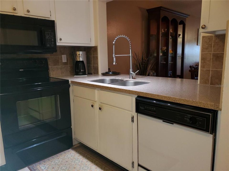 Kitchen over looks dining living room combo