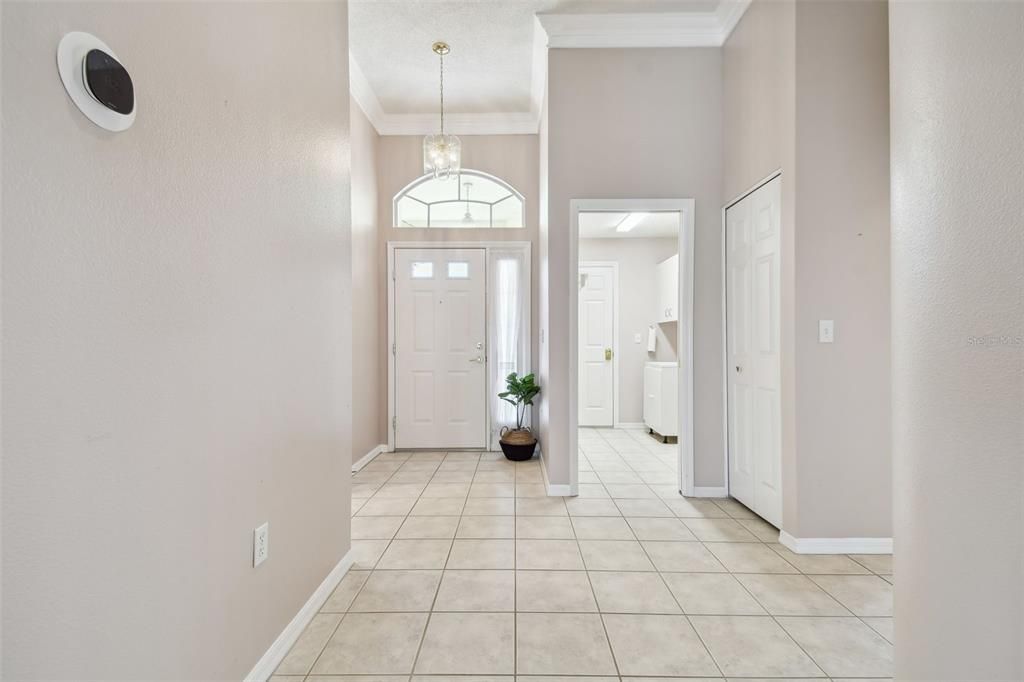 nest system and HVAC is 2023 wow!! Inside laundry room with bonus sink and cabinets that lead to the garage! Lots of storage!