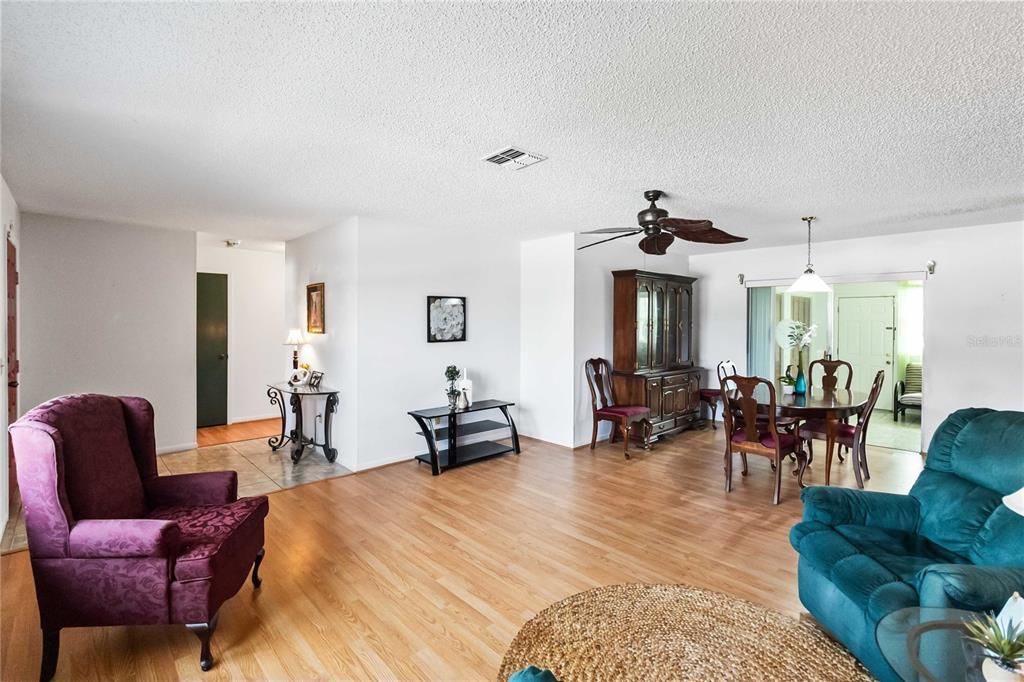 Open living space with hall to the bedrooms and right into the bonus room