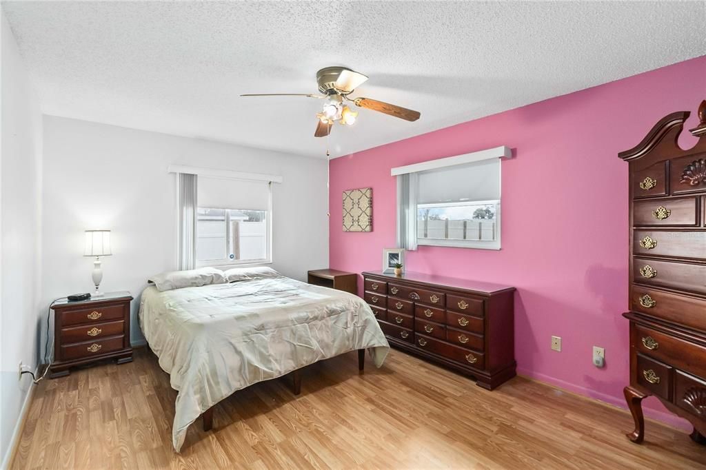 Main bedroom with laminate floors