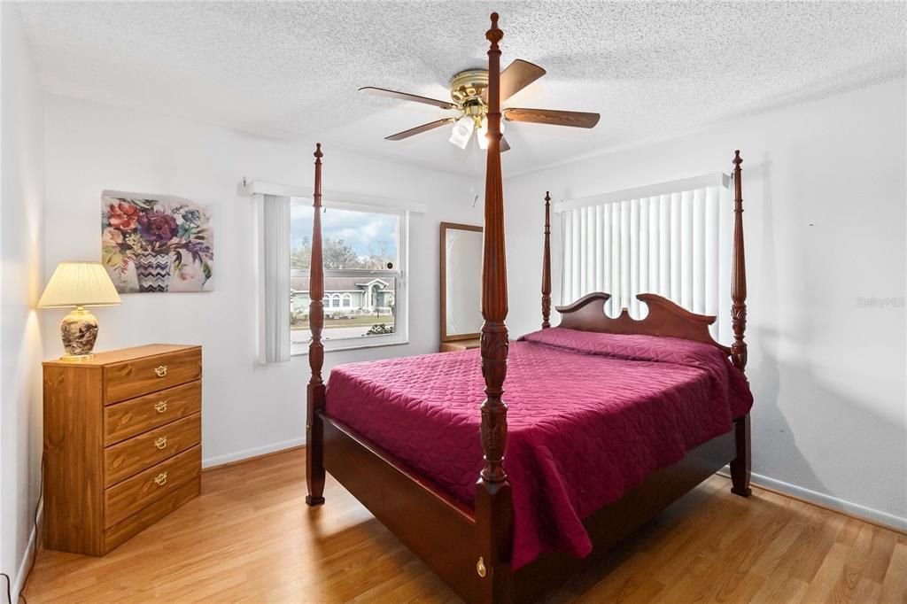 2nd bedroom with laminate floors