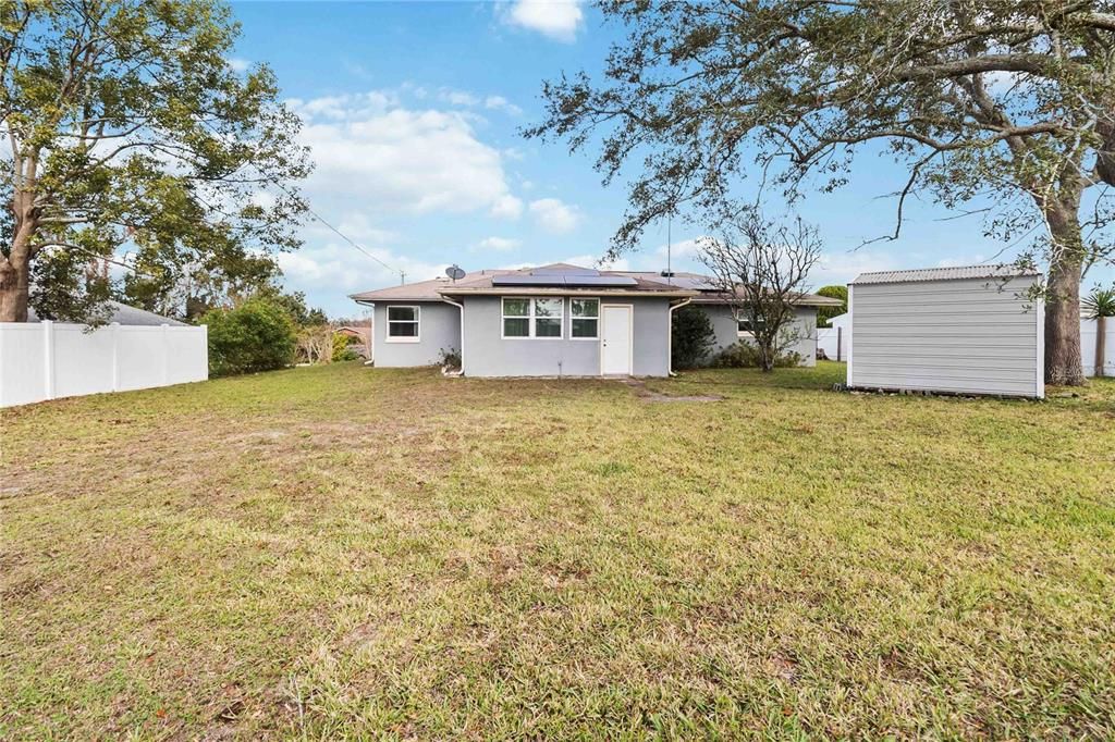 Large backyard with shed