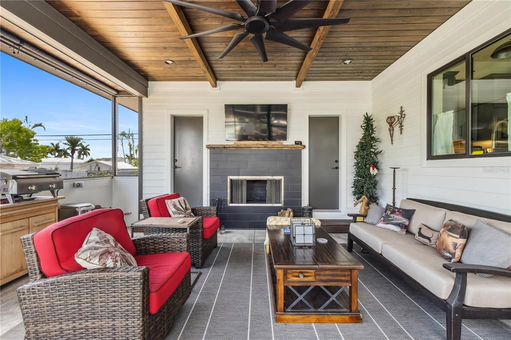 Screened porch with wood burning fireplace