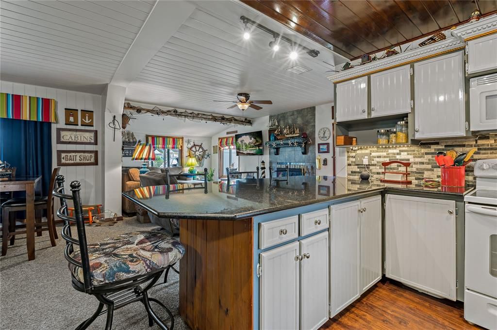 Kitchen Breakfast Bar Looking toward Dining Room on left and Living Room straight ahead