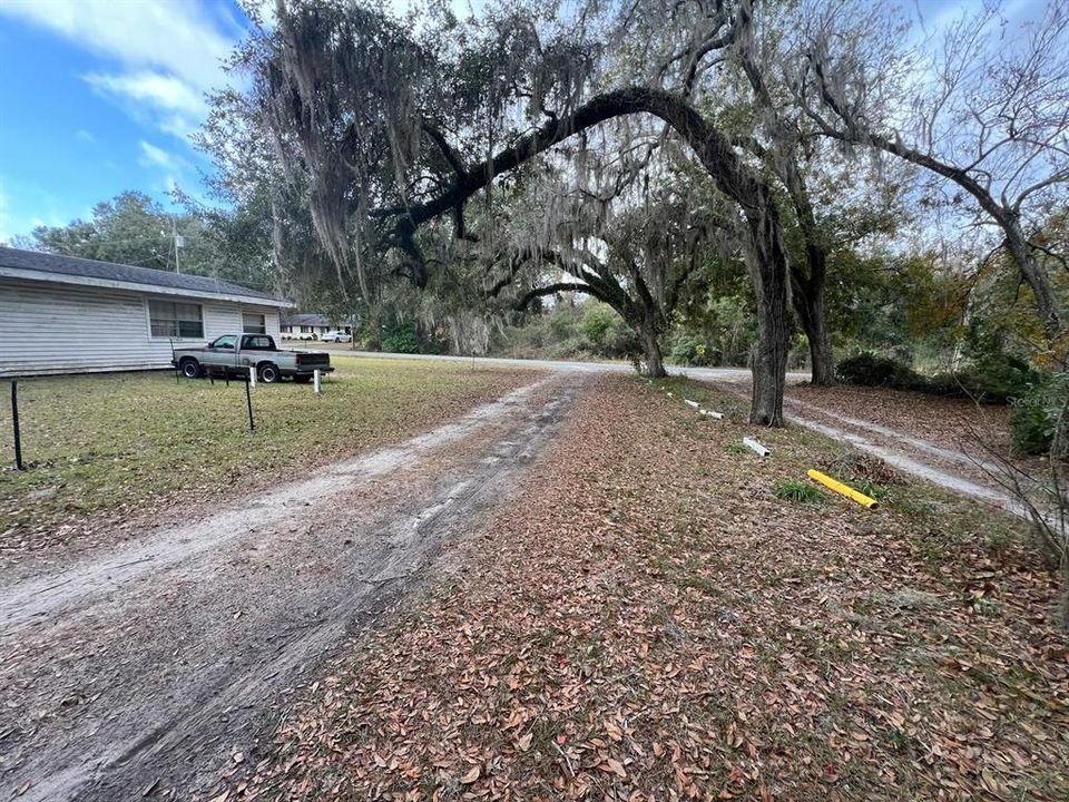 mid lot view to SE 106 Ave (to street)