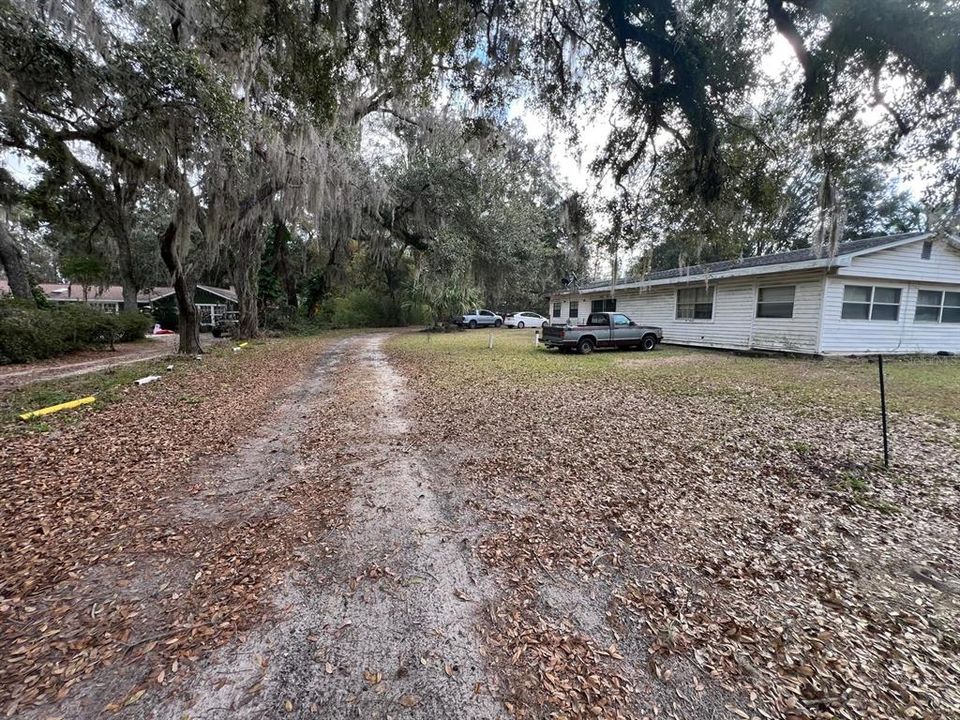 View from street into large deep lot