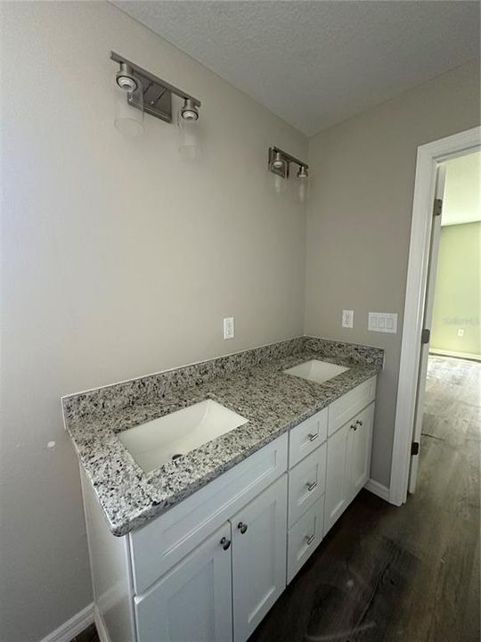 Current under construction master bath, two sinks in vanity.