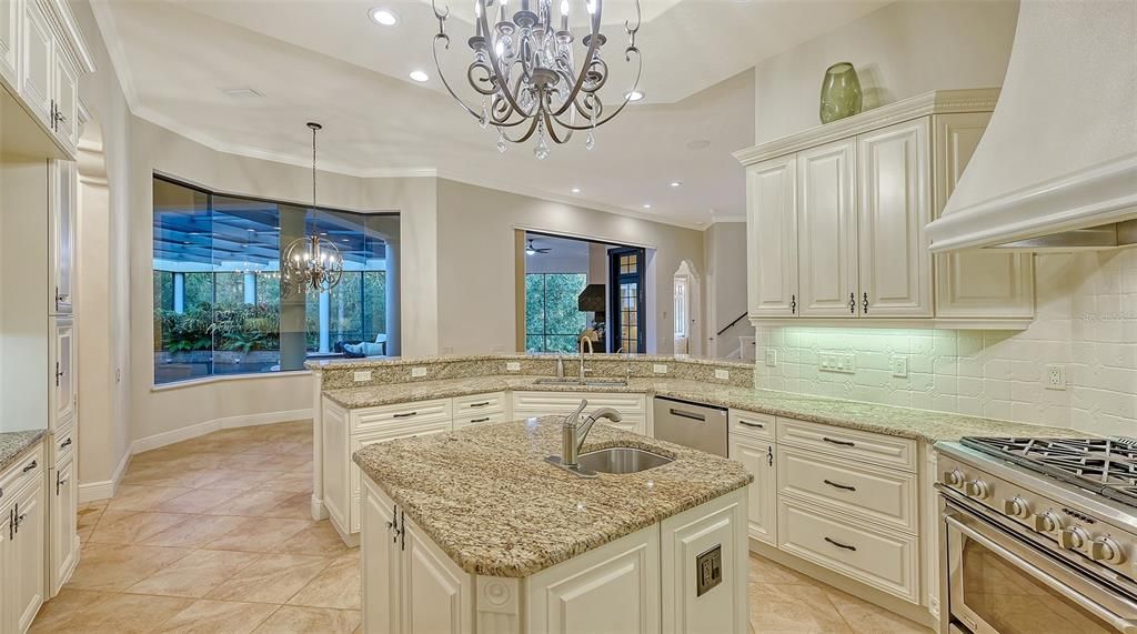 The kitchen overlooks the outdoor entertainment area