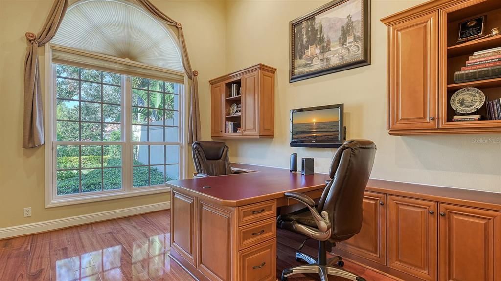 The Office features brand new cherry hardwood floors and a well appointed built-in desk plus cabinets