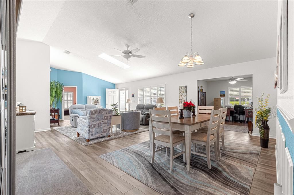 dining room, living room, den view looking toward entrance