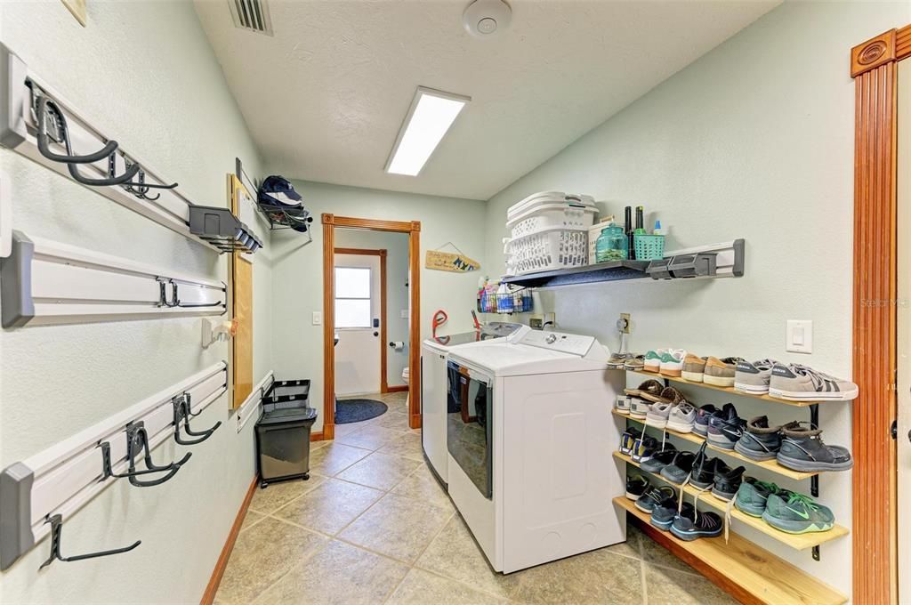 Laundry room with built-in cabinets