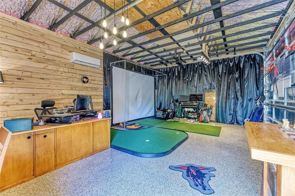 almost 600 square feet. Currently used as an office with a golf simulator! Imagine the possibilties!